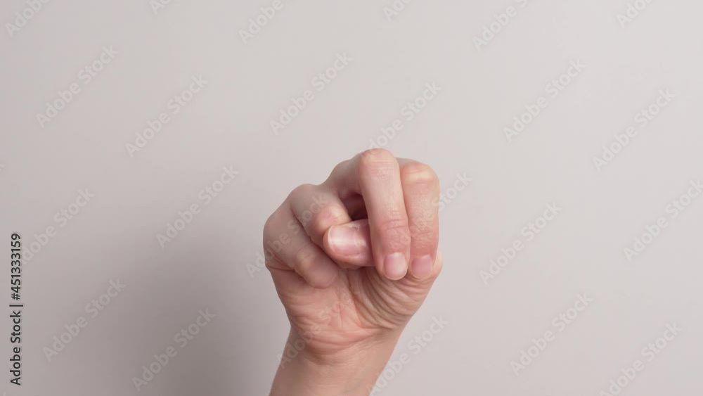 Hand Demonstrating Letter N In Sign Language Isolated On White Background. - Close Up Shot Hand Demonstrating Letter N In Sign Language Isolated On White Background. - Close Up Shot