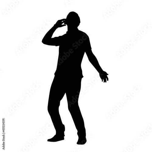 Silhouette of a Man Using The Phone