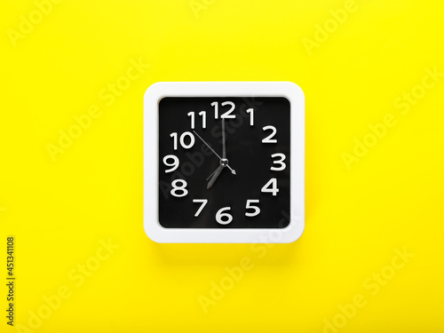 Stylish clock on color background