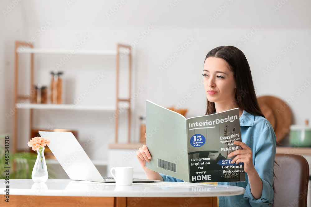Beautiful young woman reading magazine at home Beautiful young woman reading magazine at home