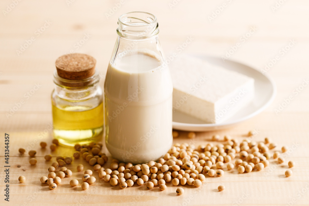soy milk in a bottle on wooden table