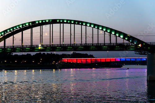 Belgrade, Serbia -  July 27, 2021: View of the Bridge on the Sava river from Belgrade Waterfront at night photo