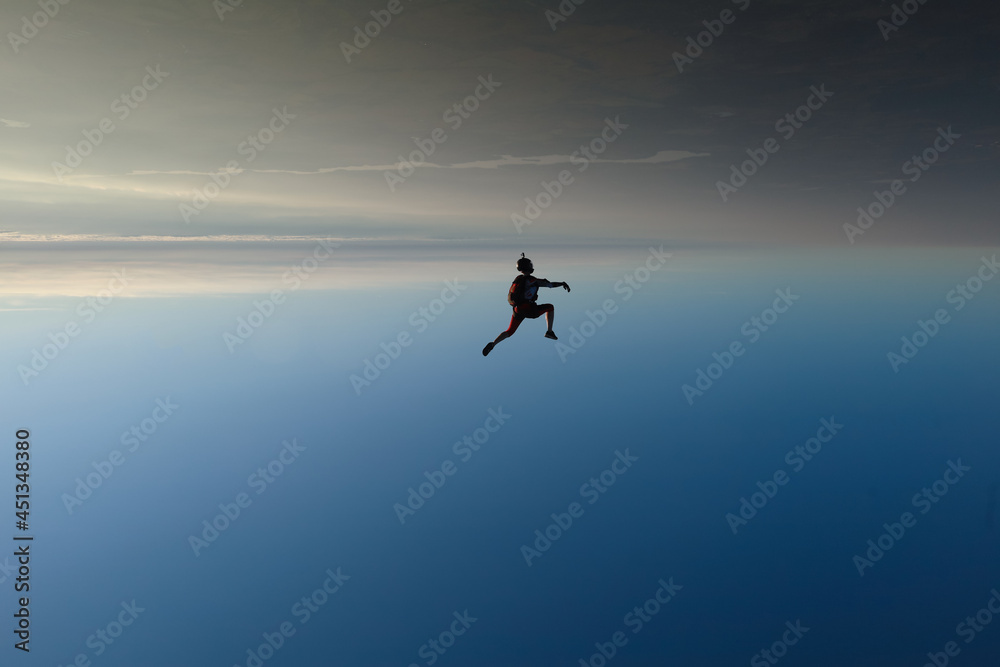 Skydiving. Freefly jump. A girl is having fun in the sky. Skydiving. Freefly jump. A girl is having fun in the sky.