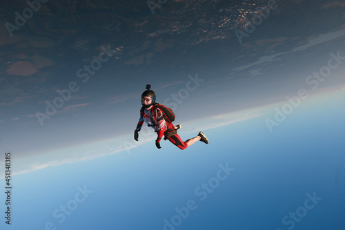 Skydiving. Freefly jump. A girl is having fun in the sky. © Sky Antonio
