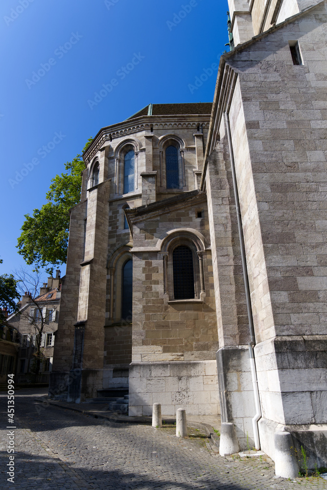 Protestant cathedral of St. Peter at the old town of Geneva on a sunny summer morning. Photo taken July 29th, 2021, Geneva, Switzerland.