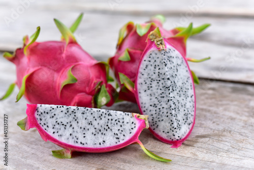 Dragon fruit on old wood background Healthy fruits