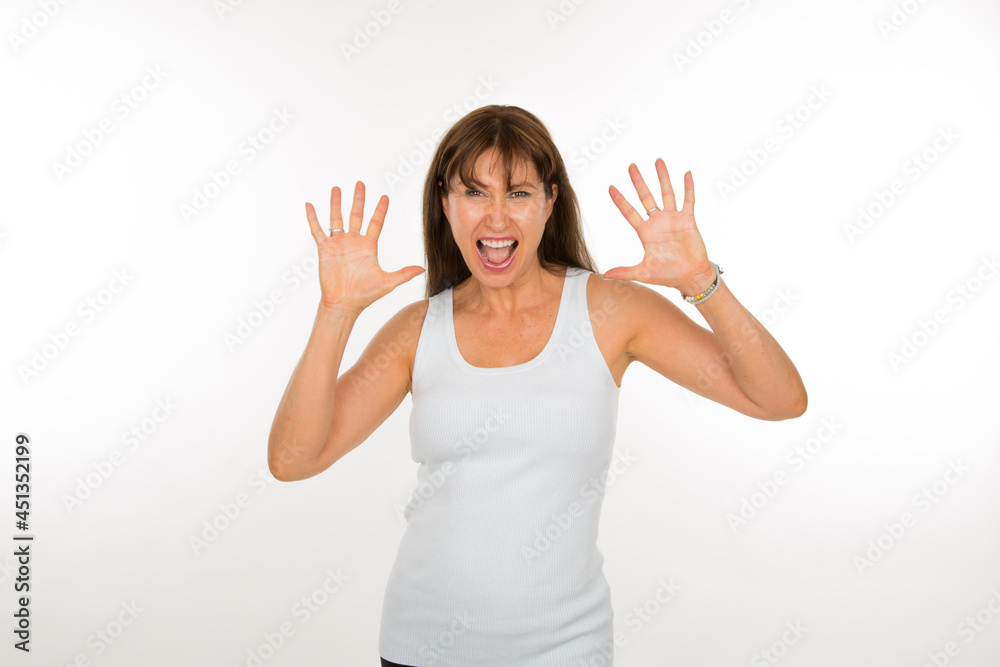 portrait caucasian senior woman with joy expression with hands up on white background portrait caucasian senior woman with joy expression with hands up on white background
