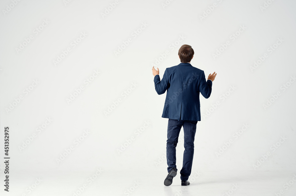 man in a jacket and tie manager Professional light background man in a jacket and tie manager Professional light background