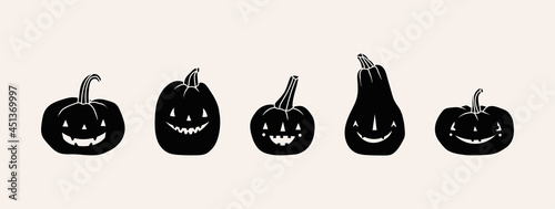 Different Pumpkins. Main symbol of the happy holiday of Halloween.  Black pumpkins with various funny faces. Template For your design. Hand drawn trendy Vector illustration. All elements are isolated