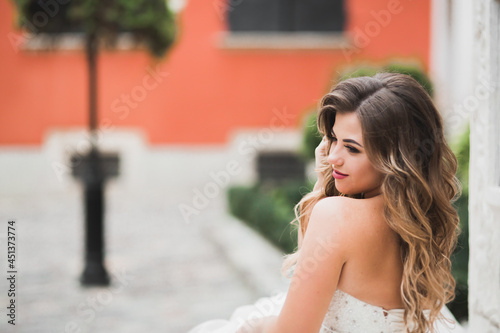 Beautiful luxury bride in elegant white dress © olegparylyak