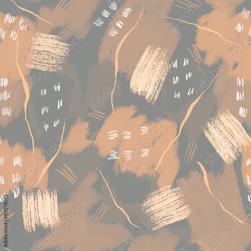 Beige, brown and orange spots and dots in seamless pattern on grey 