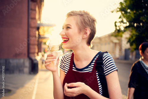 cheerful woman outdoors ice cream fresh air lifestyle