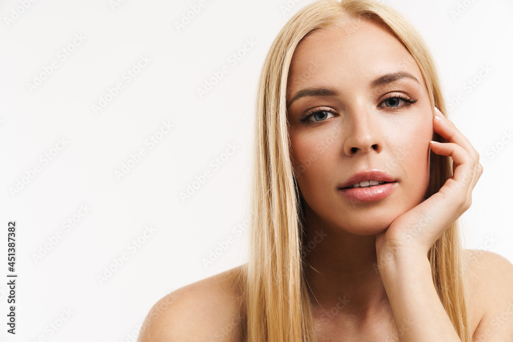 Half-naked blonde woman posing and looking at camera Half-naked blonde woman posing and looking at camera
