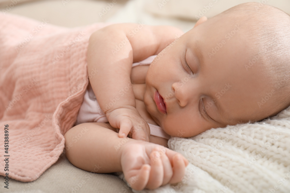 Cute little baby sleeping on blanket at home, closeup Cute little baby sleeping on blanket at home, closeup