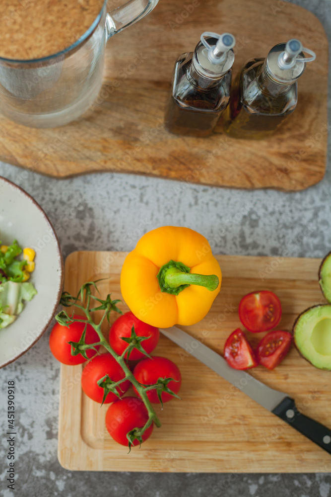 Healthy food. Avocado, cherry tomatoes, bell peppers, corn. Healthy food. Avocado, cherry tomatoes, bell peppers, corn.
