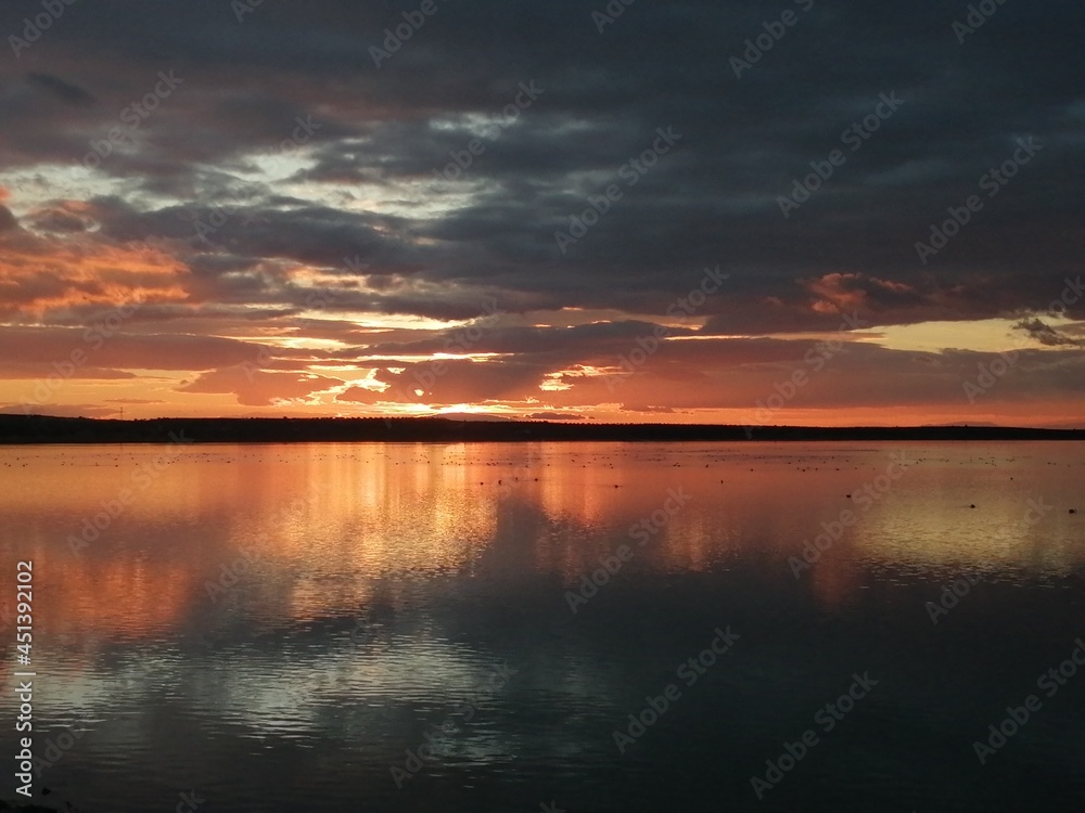 Fototapeta premium sunset over the lake