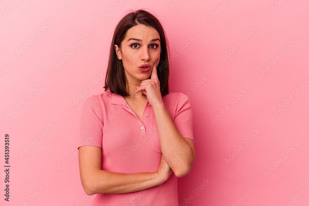 Young caucasian woman isolated on pink background having some great idea, concept of creativity. Young caucasian woman isolated on pink background having some great idea, concept of creativity.