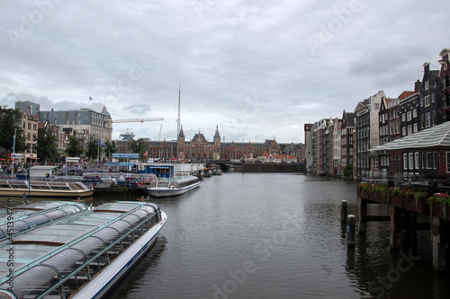 Canal Boats Attraction At The Damrak Amsterdam The Netherlands 16-8-2021
