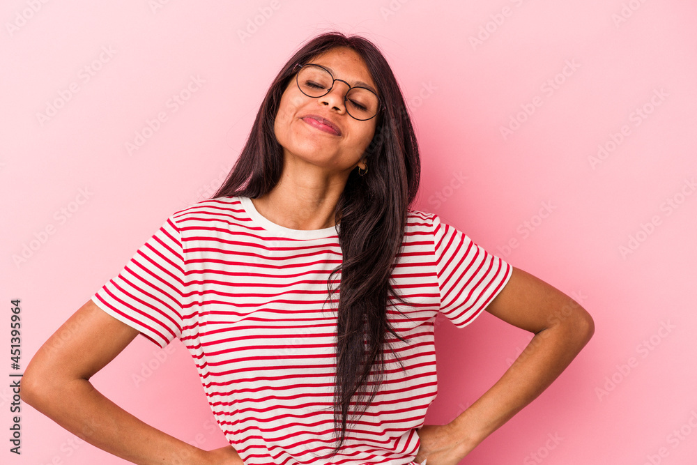 Young latin woman isolated on pink background dreaming of achieving goals and purposes Young latin woman isolated on pink background dreaming of achieving goals and purposes