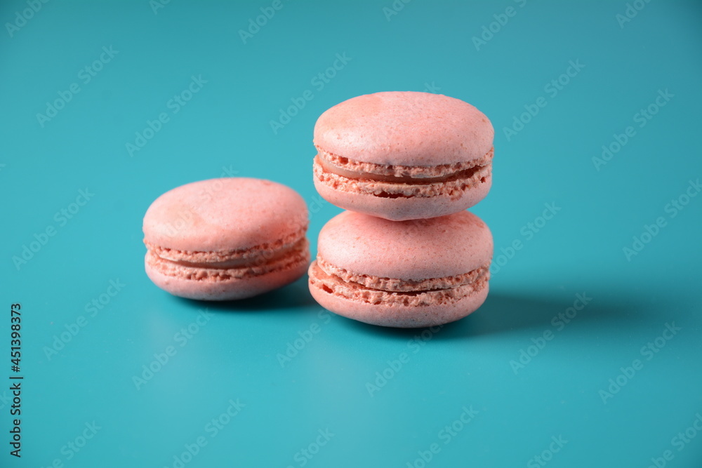 Colorful macarons cakes. Small French cakes. Sweet and colorful french macaroons, colorful almond cookies, pastel colors Colorful macarons cakes. Small French cakes. Sweet and colorful french macaroons, colorful almond cookies, pastel colors