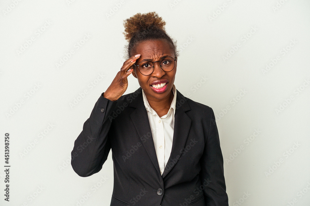 Young business african american woman isolated on white background showing a disappointment gesture with forefinger. Young business african american woman isolated on white background showing a disappointment gesture with forefinger.
