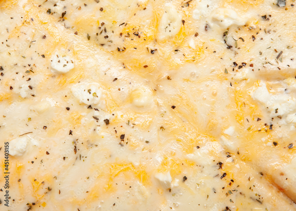 Closeup texture of cheese pizza Closeup texture of cheese pizza