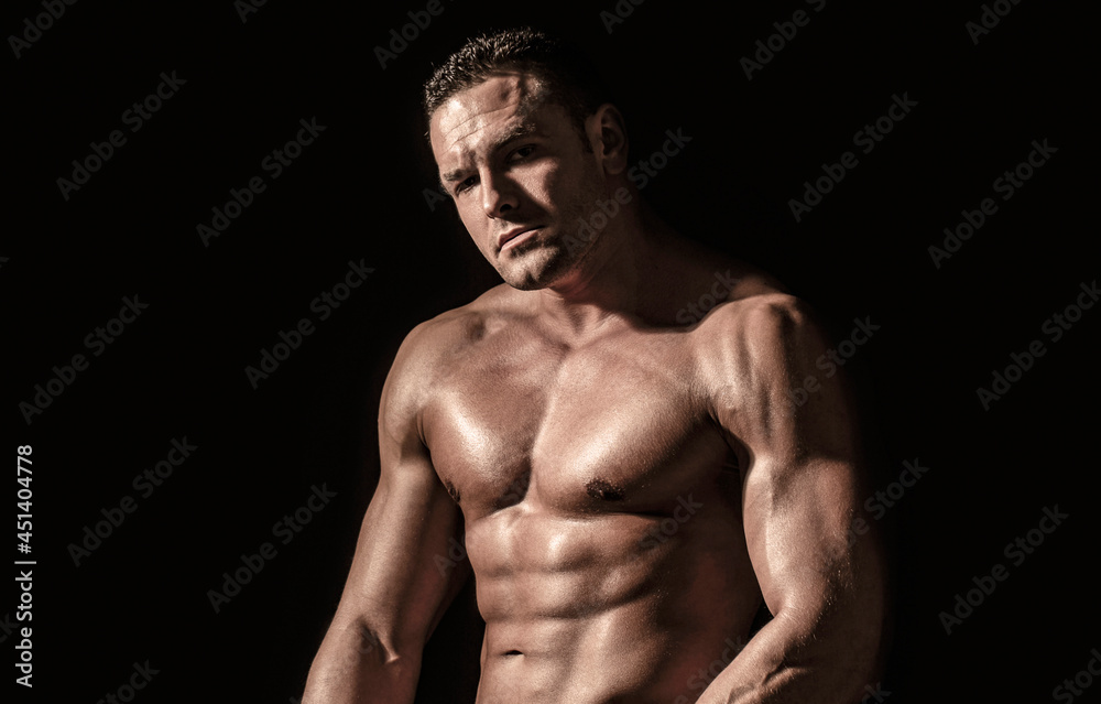 Sexy naked torso. Sport workout bodybuilding concep. Muscular torso and chest. Isolated on black background. Sporty man. Sport workout bodybuilding concept. Sexy closeup topless male model Sexy naked torso. Sport workout bodybuilding concep. Muscular torso and chest. Isolated on black background. Sporty man. Sport workout bodybuilding concept. Sexy closeup topless male model