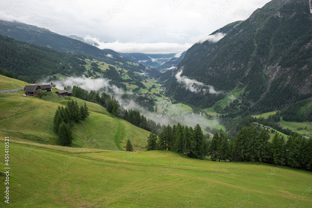 Clouds moves up from the valley in the Alps. Austria