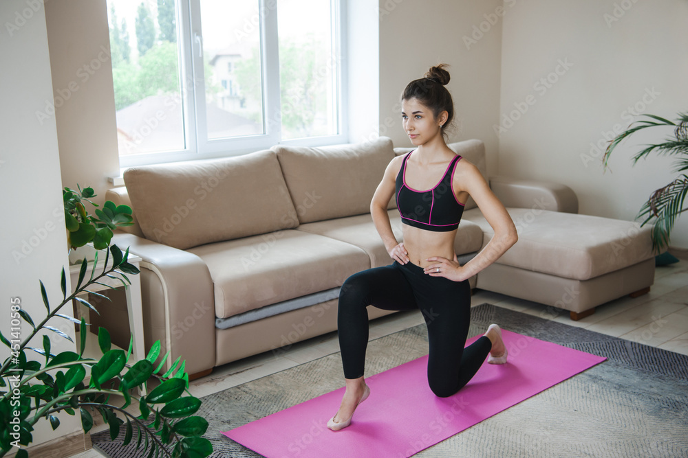 Sport, healthy lifestyle. Woman at home doing fitness on floor in beautiful style. Sport, healthy lifestyle. Woman at home doing fitness on floor in beautiful style.