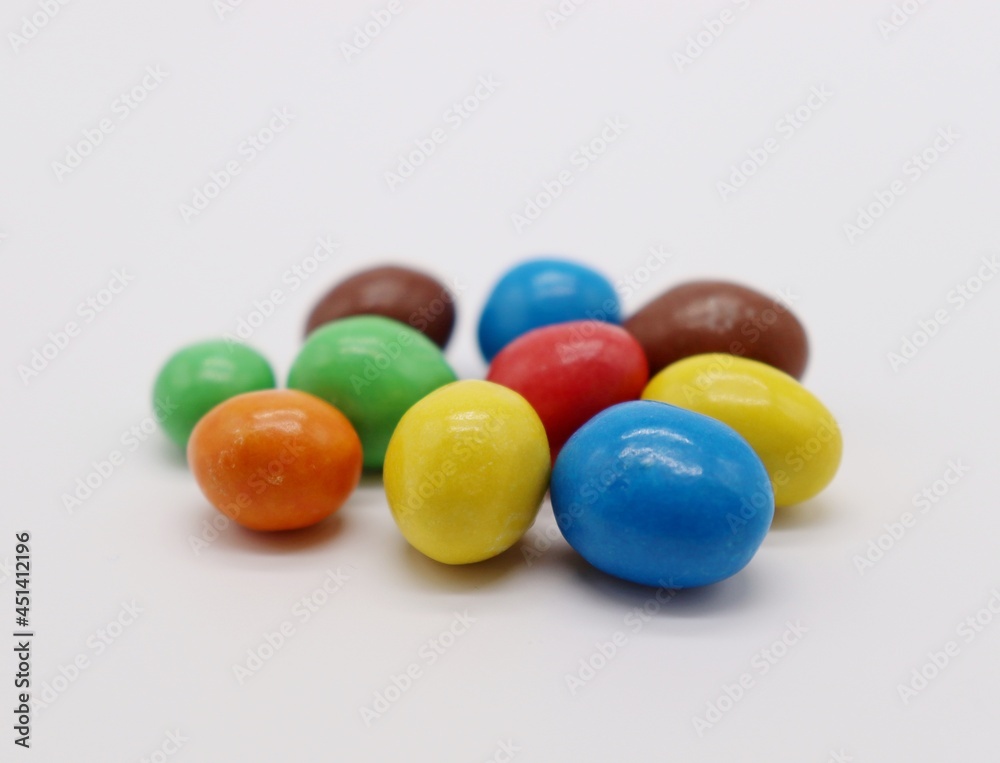 colorful chocolate candy on white background colorful chocolate candy on white background