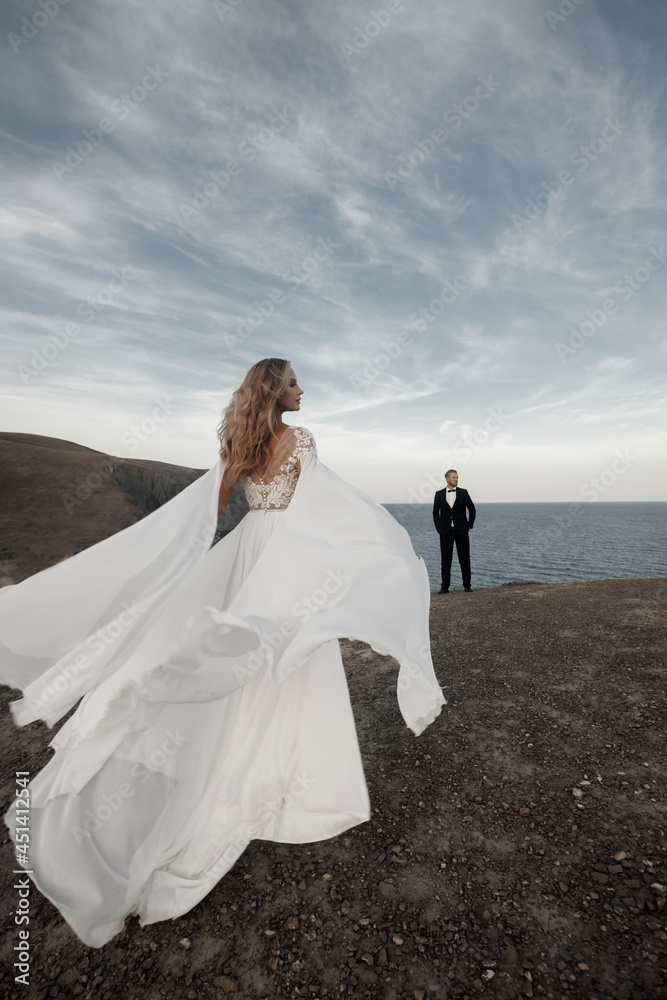 Fashion bride in beautiful wedding dress outdoor Fashion bride in beautiful wedding dress outdoor