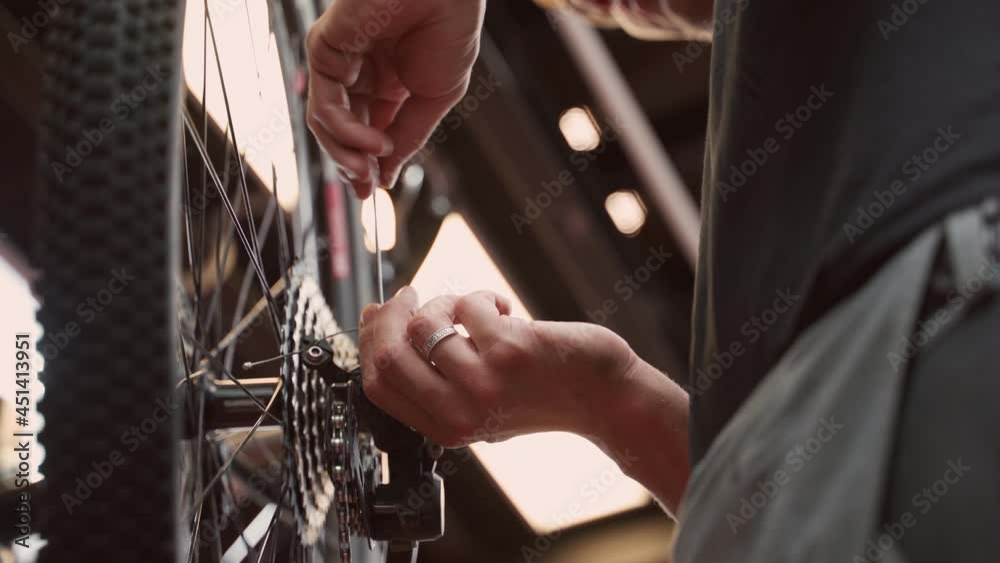 Crop mechanic using wrench and adjusting bicycle wheel spokes