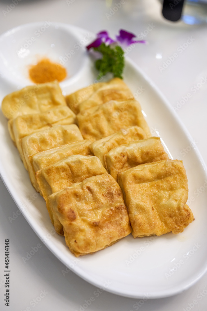 A delicious Chinese dish, deep-fried tofu with milk