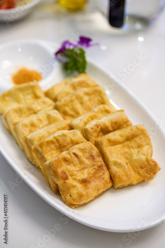 A delicious Chinese dish, deep-fried tofu with milk