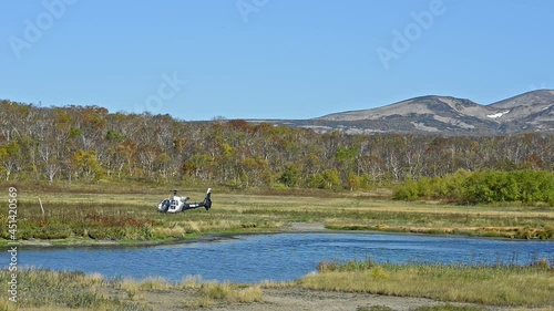 nature helicopter on riverbank Contemporary aircraft Avki