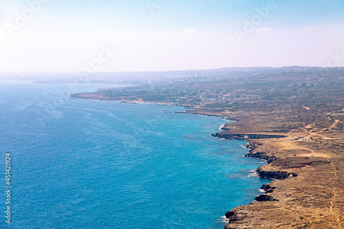 View from cape Capo Greco on the island of Cyprus. Mediterranean sea with fog in the distance. National Forest Park is located between the resort towns of Ayia Napa and Protaras. 