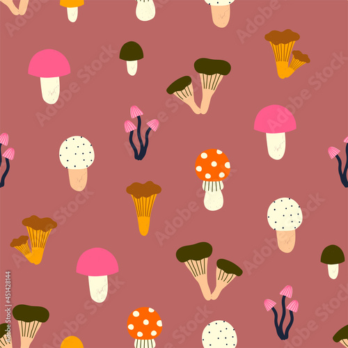 Cute hand drawn seamless pattern of colorful mushroom. Vector illustration for fabric or wrap paper design.