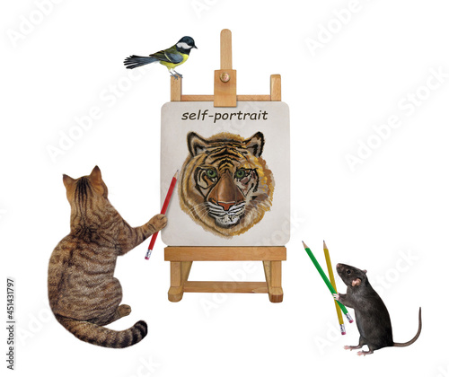 Fotografie A gray cat artist with a pencil paints his self-portrait on a canvas on an easel