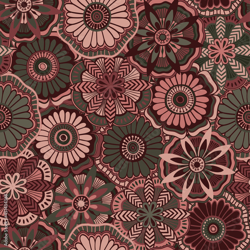 Seamless pattern with decorative flowers in pink and green colors