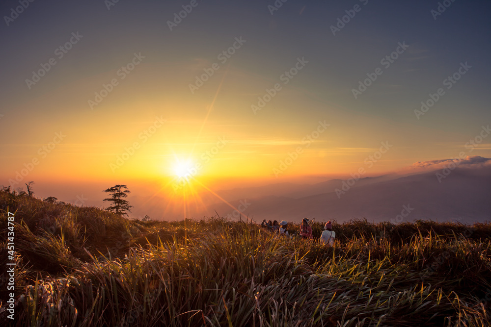 Obraz premium Beautiful foggy sunrise landscape.