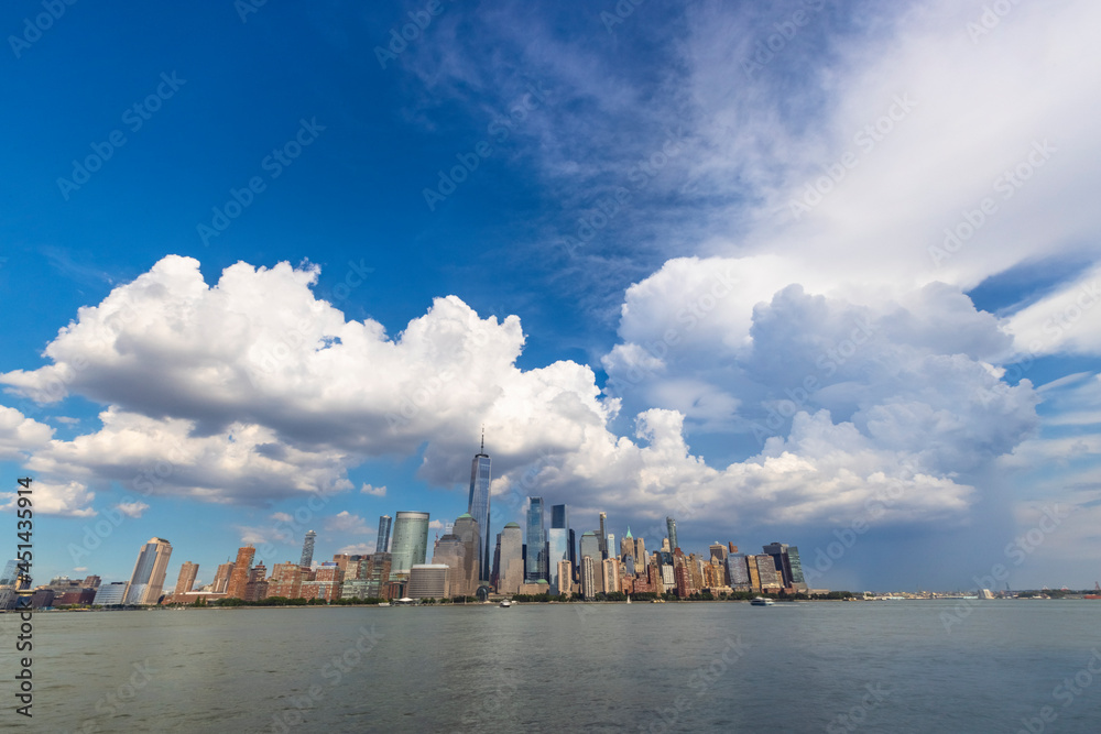 Summer clouds cover the Lower Manhattan skyscraper on June 9 2021 in New York City NY USA.