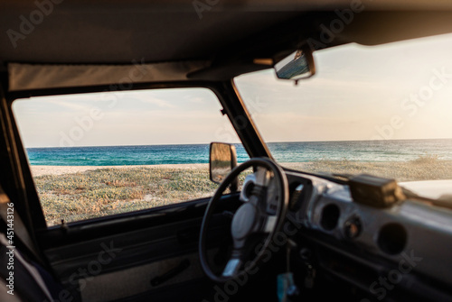 Wallpaper Mural Beach at sunset Viewed from inside old car window. Torontodigital.ca