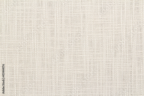 Texture of linen fabric as a background or backdrop, beautiful weaving of threads, copy space.