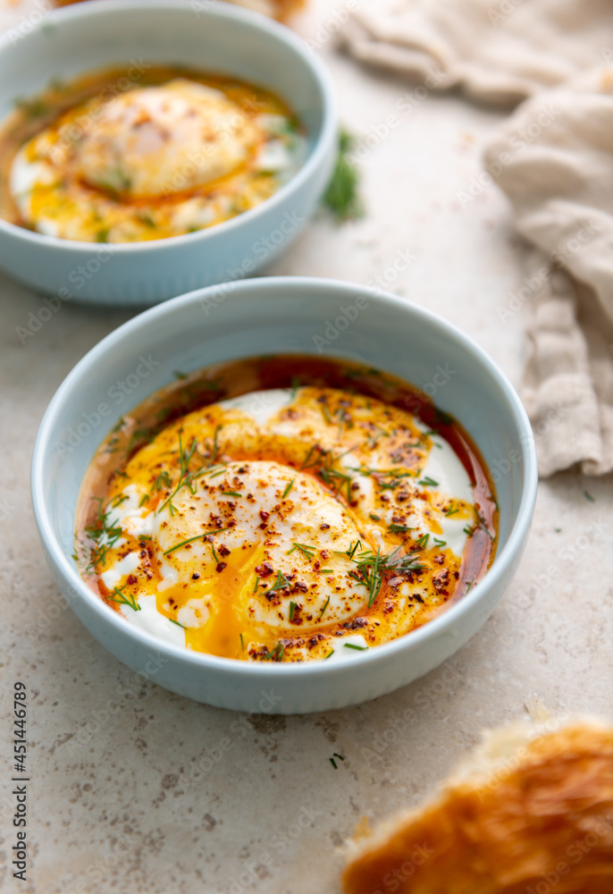 Turkish Eggs Dish Cilbır in Small Blue Bowl Turkish Eggs Dish Cilbır in Small Blue Bowl