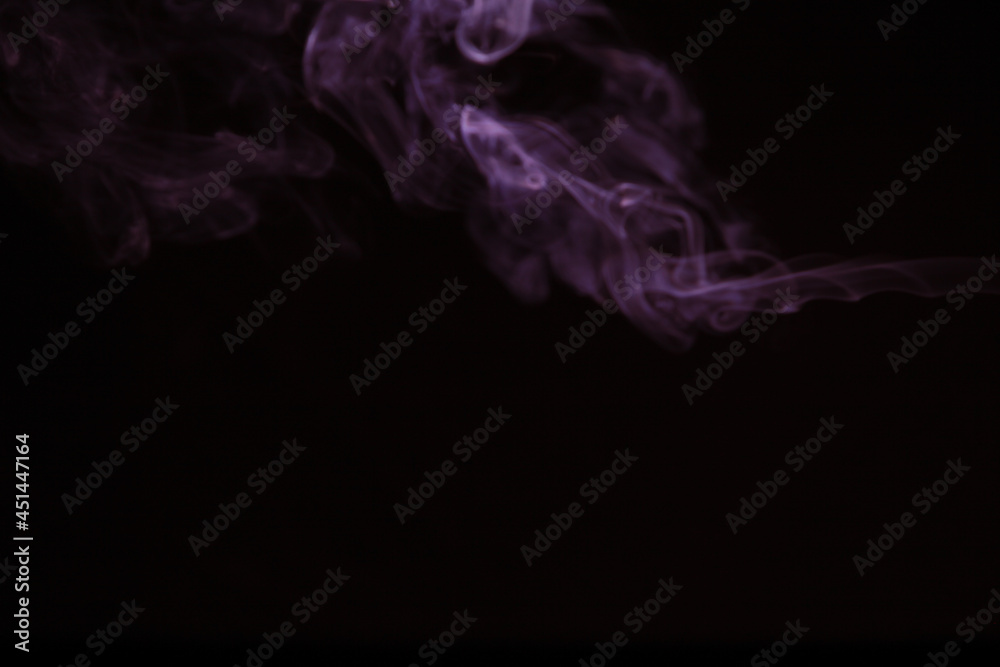 Purple smoke on black background. Purple smoke on black background.