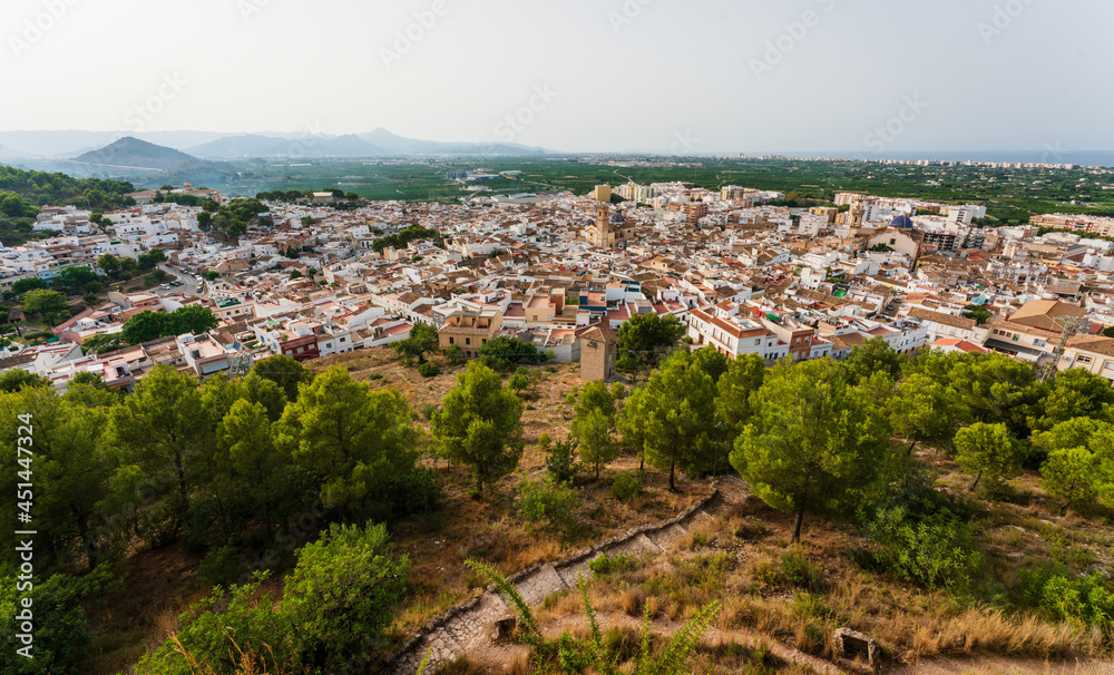 Panorama view from the castle 'Santa Anna' on the Spanish old town with the church 'San Roque', Oliva, Spain