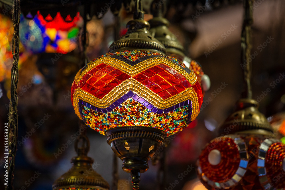 Colorful turkish mosaic glass lamps for sale at the street market in Istanbul, Turkey