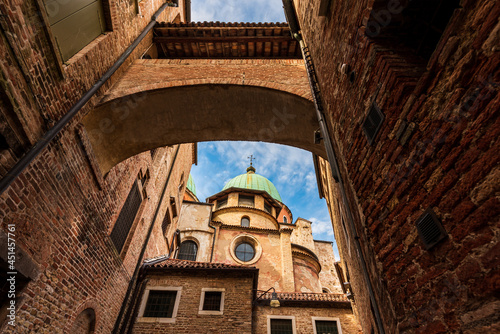 Treviso Cathedral ( Duomo di Treviso, Cathedrale di San Pietro Apostolo ) on a sunny summer day. Italy. photo