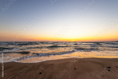 Beautiful tropical sunrise on the beach. © ba11istic
