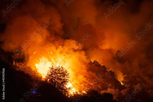 Incendio forestal por la noche en Ourense, Galicia, Spain. photo
